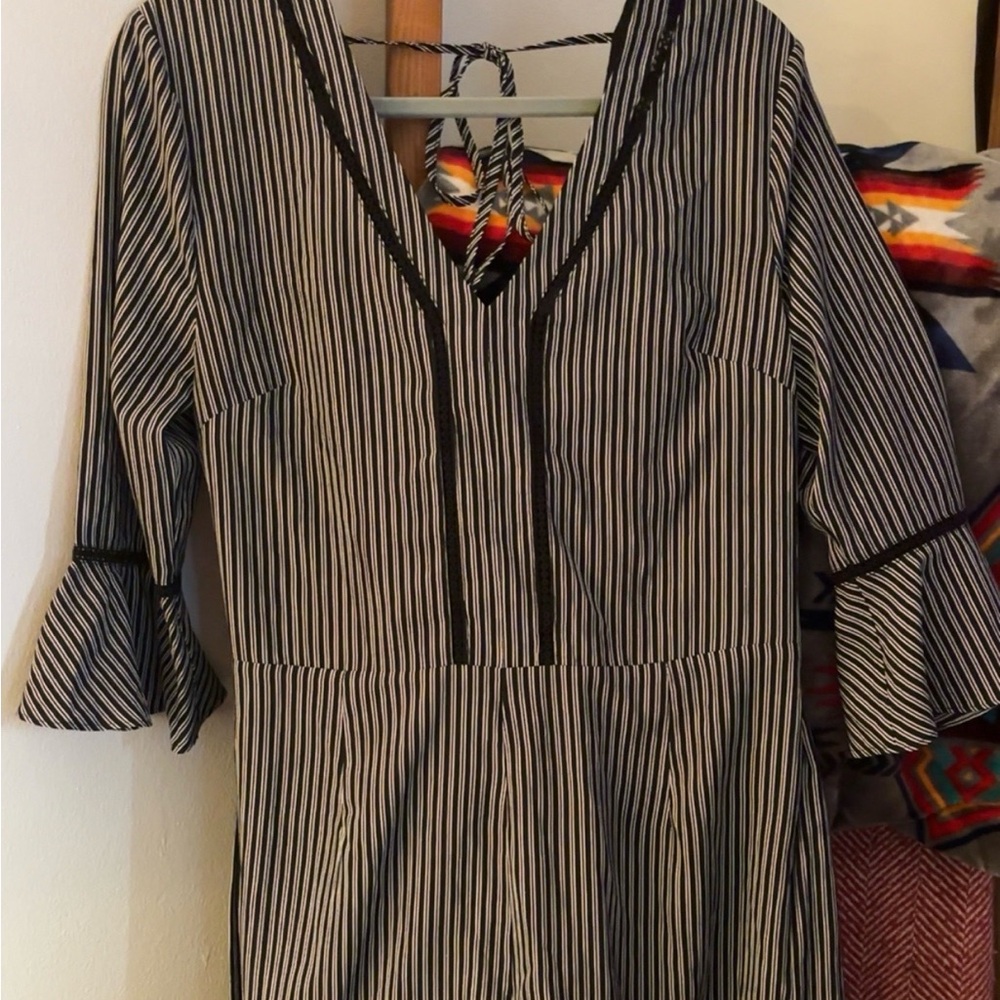 Black and White Ruffled Jumpsuit with Fitted Style